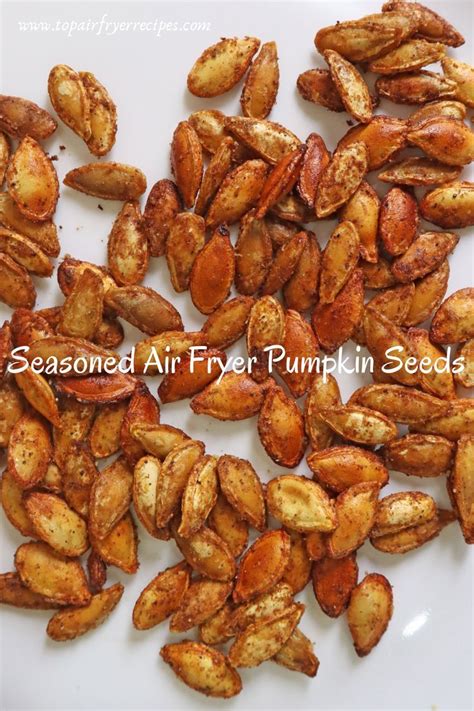 Roasted Air Fryer Pumpkin Seeds On A White Plate