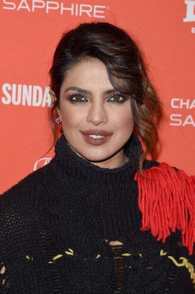 Priyanka Chopra S Modern Take On The Sari Included A Thigh High Slit Skirt And Holographic