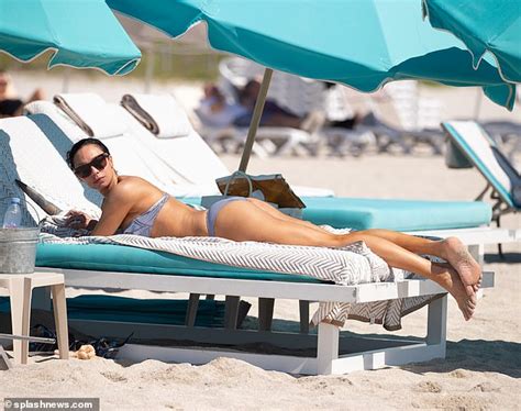 Lilly Becker Flaunts Her Figure In Blue Striped Bikini As She Soaks Up The Sun In Miami