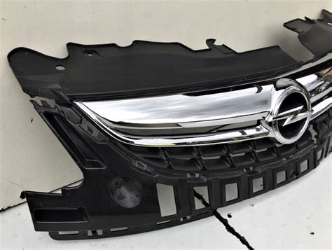 OPEL CORSA D LIFT CHROM ATRAPY GRILLA 13286000 ORG 7644955439