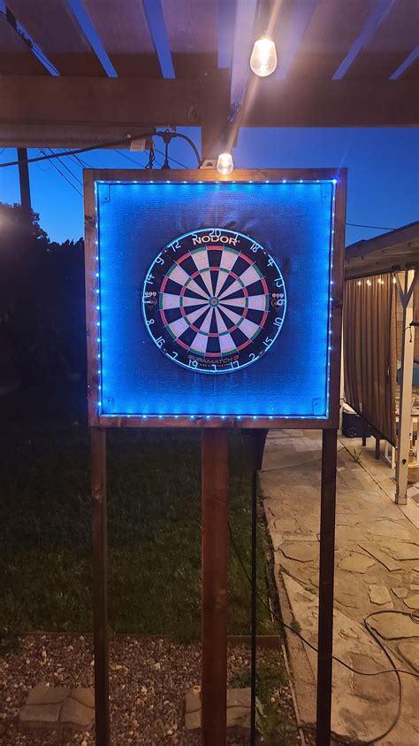 Update on my dart board setup. Inlaid an LED light strip to it. : r/Darts