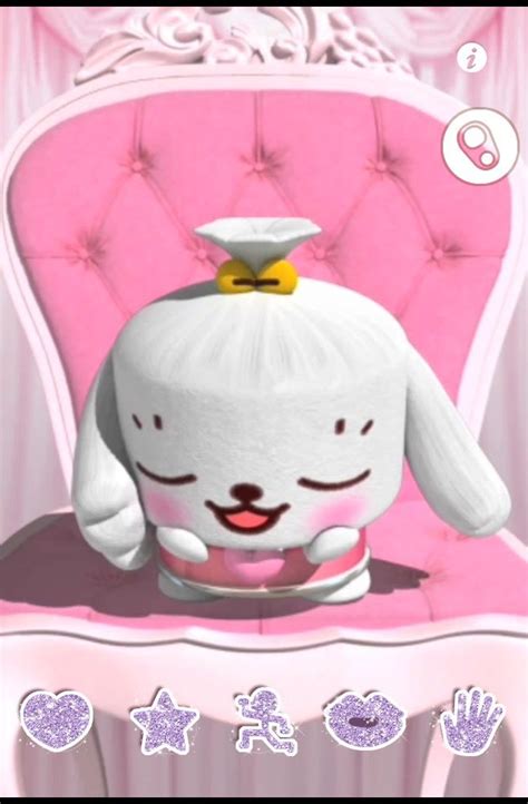 a white bunny sitting on top of a pink chair
