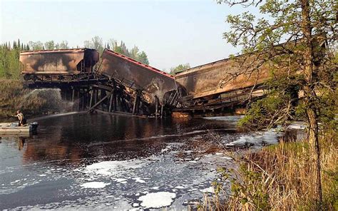 Railroad trestle burns, collapses along busy rail line - Brainerd ...