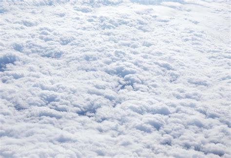 Clouds seen from plane background 5461165 Stock Photo at Vecteezy