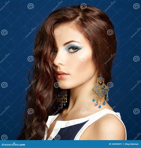 Portrait Of Beautiful Brunette Woman With Earring Perfect Makeup Stock