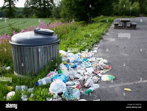 Highway Rest Stop Area Trash Bin Overflowing At Summertime Finland