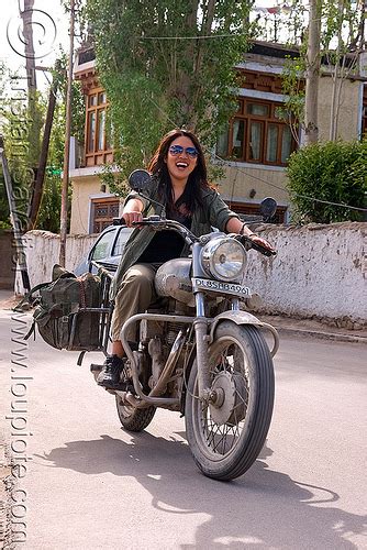 Woman Riding Royal Enfield Motorcycle Leh India