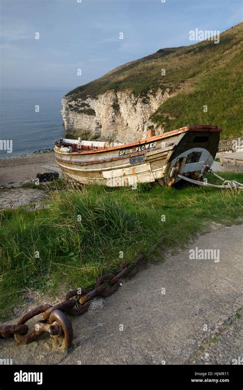 Old Traditional Wooden Fishing Boat Yorkshire Coble Moored At The Top