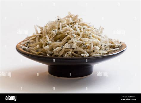 Dried Japanese Mini Anchovies Engraulis Japonicus On Dish Stock Photo