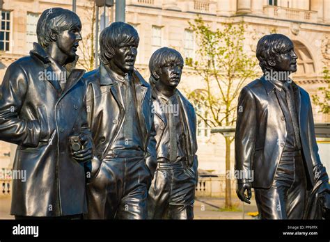 Liverpool UK May 17 2018 Bronze Statue Of The Beatles Stands At The