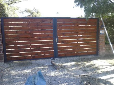 Cerramientos Y Portones En Hierro Y Madera En Pergola