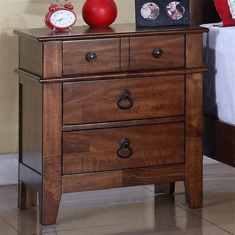 A Wooden Chest With Two Drawers On One Side