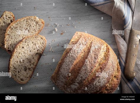 Sliced Artisan Loaf Of Bread From Above Stock Photo Alamy