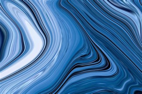 Premium Photo | A blue and black marble background with a blue swirl pattern.