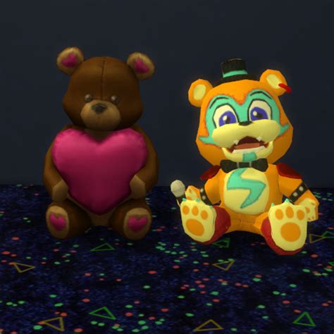 Two Teddy Bears Sitting Next To Each Other On A Blue Carpet With Stars