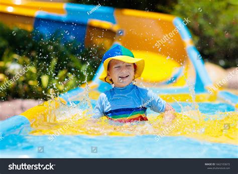 Kids On Water Slide Aqua Park Stock Photo (Edit Now) 1662103672