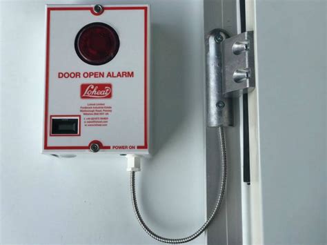 Alarm System For Door Opening