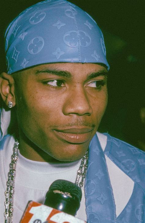 Nelly Photographed By Ron Galella While Attending Strapped