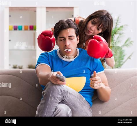 The Wife Unhappy That Husband Is Watching Boxing Stock Photo Alamy