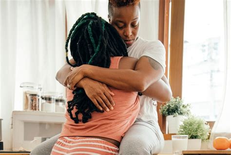 Premium Photo Happy Gay Couple Hugging In The Kitchen