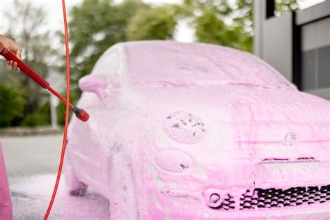 Premium Photo Washing Car With Nano Foam At Car Wash