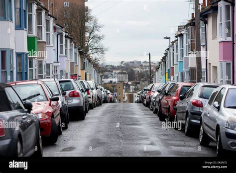 Parked Cars Lined Up In A Narrow Street In Brighton Sussex Uk Stock