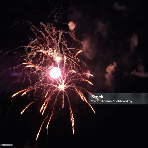 Real Fireworks With Smoke Paths On Black Sky Background For Overlay