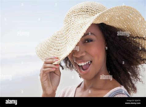 Young Woman On Beach On Windy Day Stock Photo Alamy