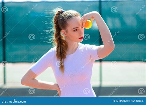 Sensual Woman With Tennis Racket At Net On Lawn Activity Energy