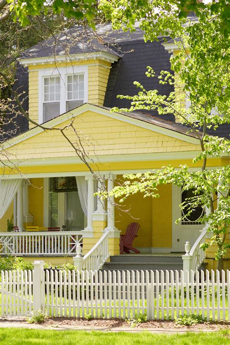 Colors That Compliment Yellow Yellow House Exterior House Colors Yellow Cottage