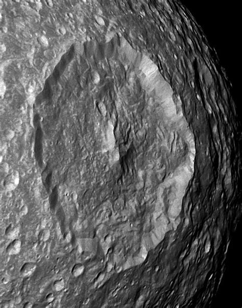 natural satellites - Why is there a mountain inside the Herschel crater ...