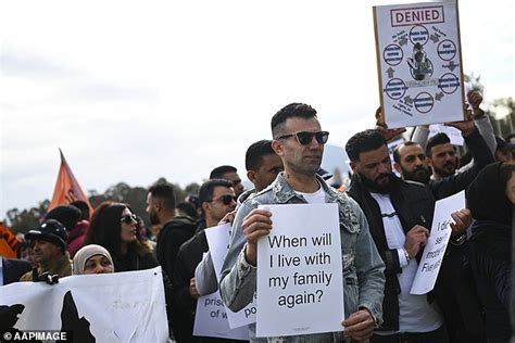 Asylum Seekers Who Arrived In Australia By Boat Join In A Protest In