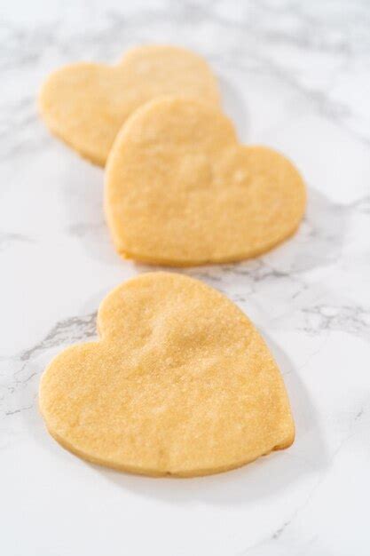 Premium Photo | Heartshaped sugar cookies with royal icing