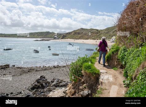 A Walker On The Coast Path At Porthdinllaen Near Morfa Nefyn Lleyn