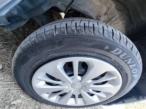 Buy Toyota Passo Rims Wheel Cover And 16565r14 Dunlop Enasave In Islamabad Pakwheels