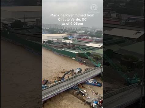 Colliding barges on Marikina River hit Pasig bridge