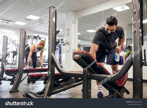 Two Gym Employees Cleaning Gym Equipment Stock Photo 1964201680