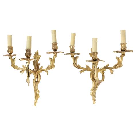 Pair of Bronze Doré Sconces in the Style of Louis XV from the 19th