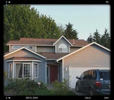 Stylish House Exterior with Brown Roof and Sherwin Williams Colors