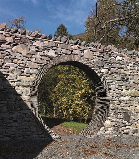 Mixed Walling Stone Circular Arch Formed In Burlington Roofing Slates