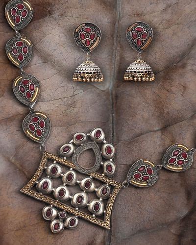 Leaf Motif Dual Tone Necklace And Jhumka With Red Stones Set Of Two