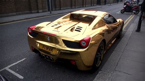 Gold Ferrari 458 Spider in a parking