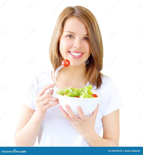 Menina Do Adolescente Que Come A Salada Isolada No Branco Foto De Stock