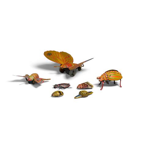 Bonhams : A GROUP OF SEVEN PAINTED METAL MECHANICAL INSECT TOYS early
