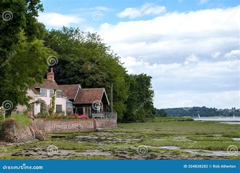 On The Edge Of The River Orwell At Pin Mill Suffolk Stock Photo