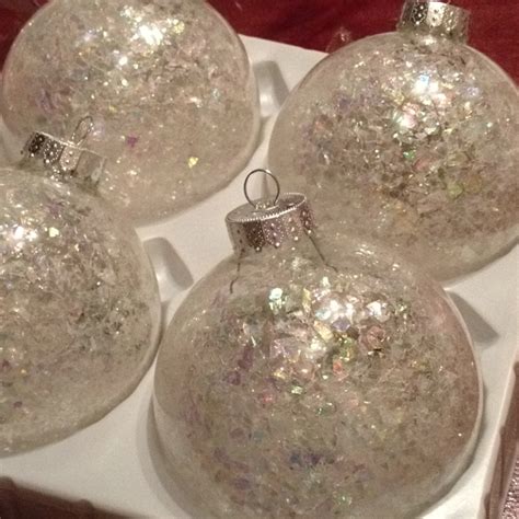 Clear Christmas Ornaments Filled With Iridescent Snow Flakes To