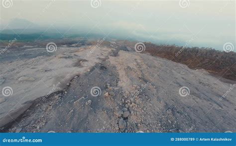 Fpv Drone Speedily Flying Down Over Active Erupting Volcano Slope With