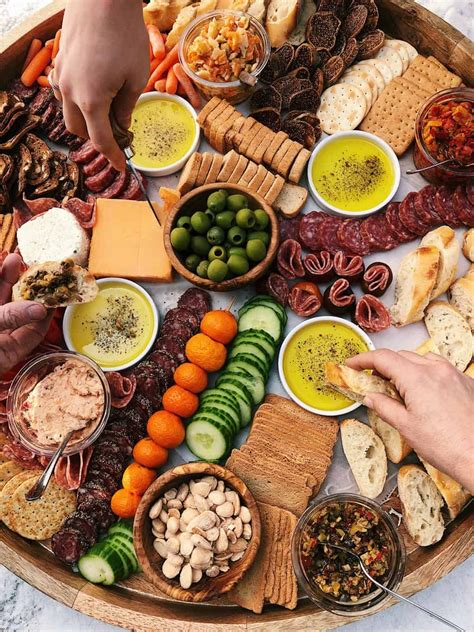 How To Make An Epic Charcuterie Board With Cured Meats Cheese Veggies Nuts Olives