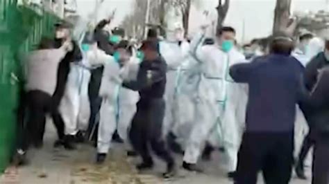 Violence in Apple's biggest iPhone factory in China 'as workers try to ...