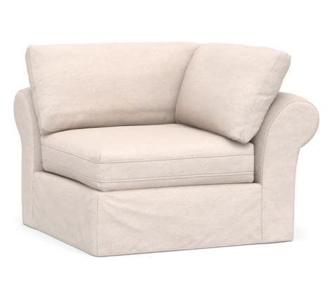 A White Chair With Pillows On It